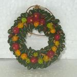 XM 110     $2.00

Williamsburg is decorated with materials from nature each Christmas season. This 3", poly-resin ornament celebrates this beautiful time in the colonial city.